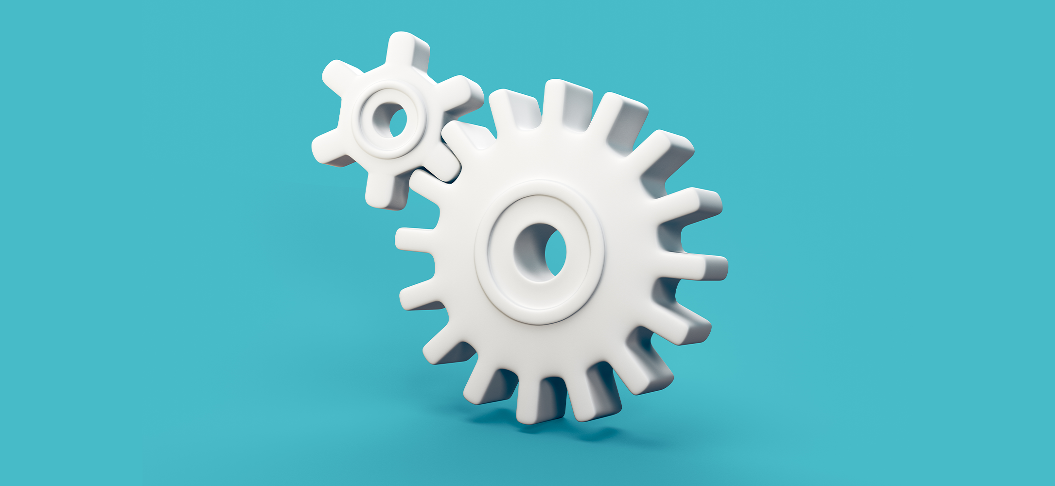Two gears together, representing partnership and teamwork